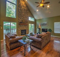 Lakefront Blue Eye Cottage with Hot Tub  Fire Pit - Hotels Find