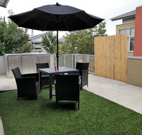 Groovy Suite with Amazing Rooftop Patio Near OTFC - Hotels Find